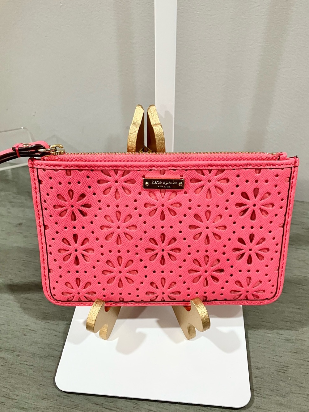 Kate Spade laser-cut floral wristlet clutch in pink